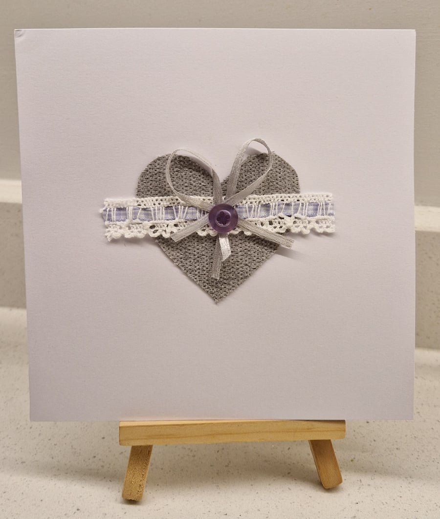 Handmade card with a single heart neutral colours fabric llilac lace bow button