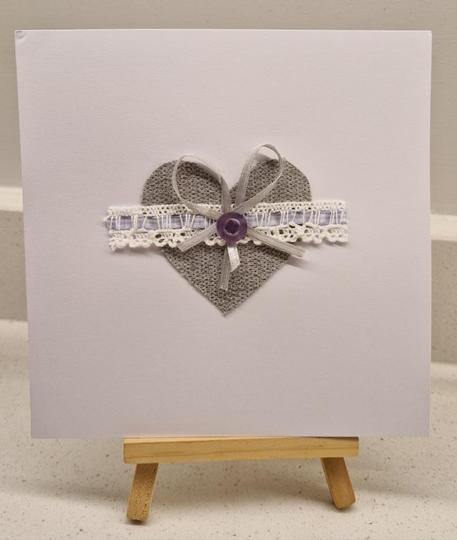 Handmade card with a single heart neutral colours fabric llilac lace bow button