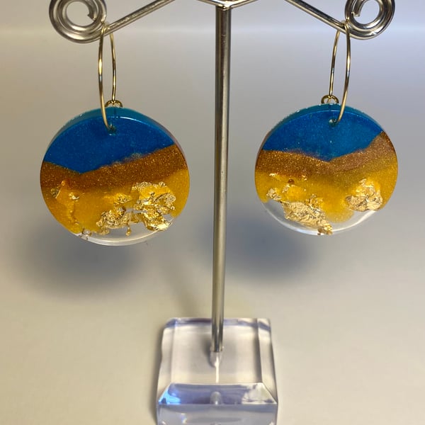 Handmade blue and gold resin and biodegradable gold glitter disc hoop earrings