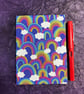 A6 Hardback Notebook with bright rainbow fabric cover