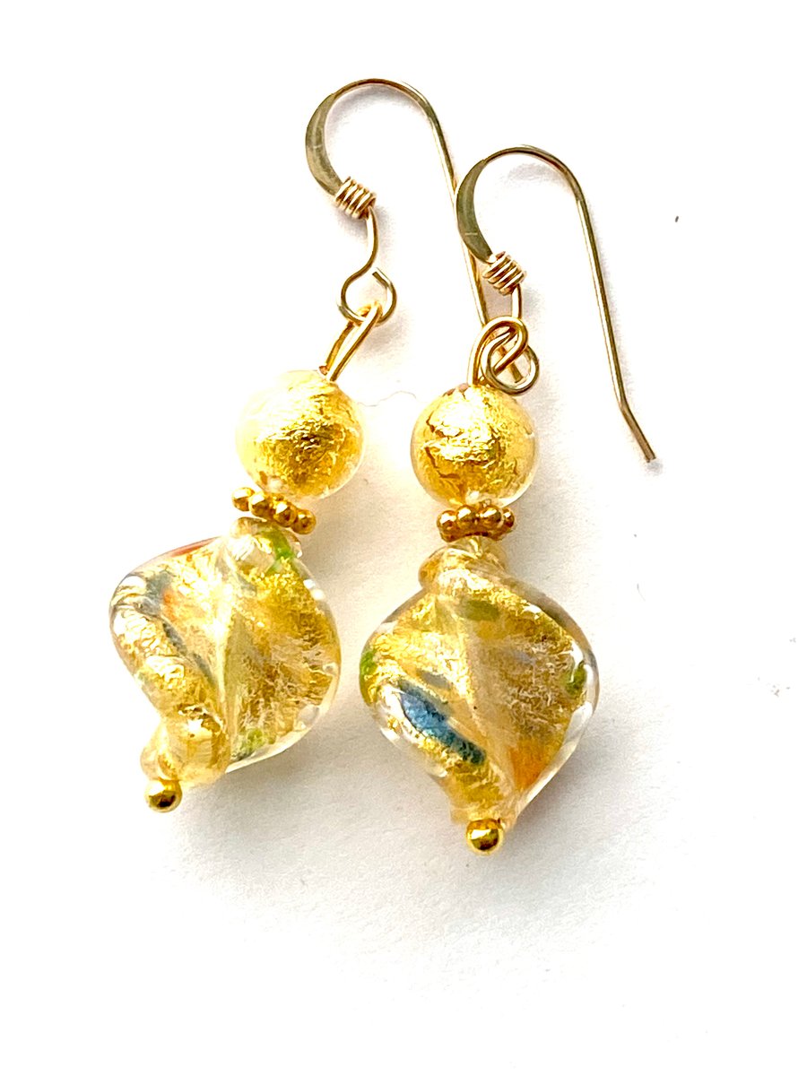 Gold Murano glass earrings with Swarovski crystal and gold filled hooks.