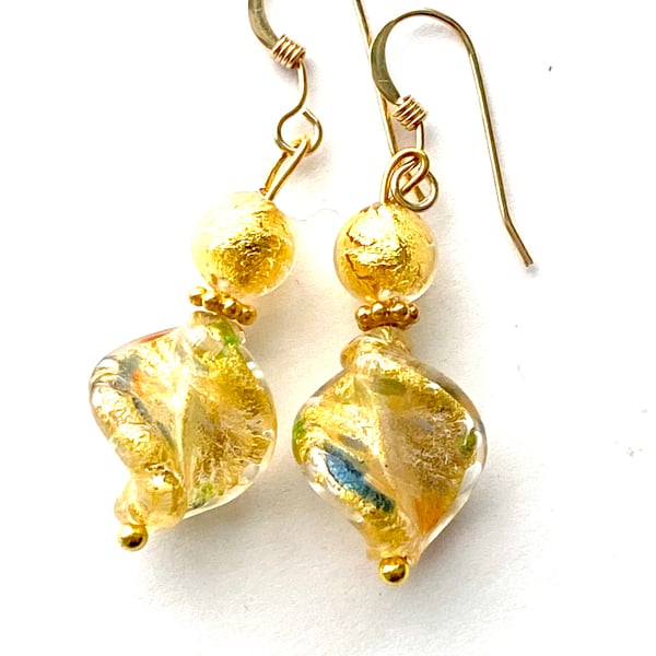 Gold Murano glass earrings with Swarovski crystal and gold filled hooks.