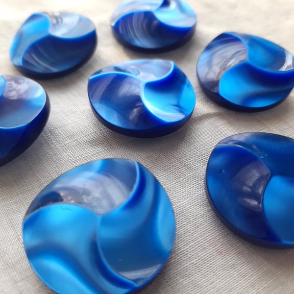 Vintage bright blue 29mm buttons, with raised design and back loop shank