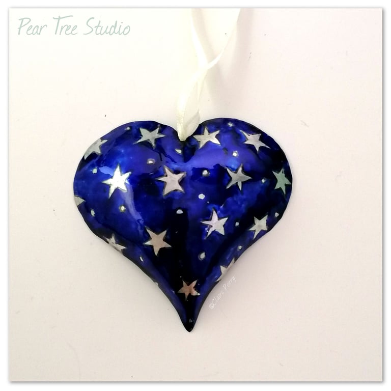 Handmade Small Blue Metal Heart Decoration with a Star pattern.
