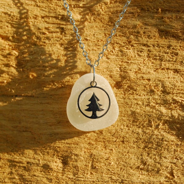 White sea glass pendant with Christmas tree charm