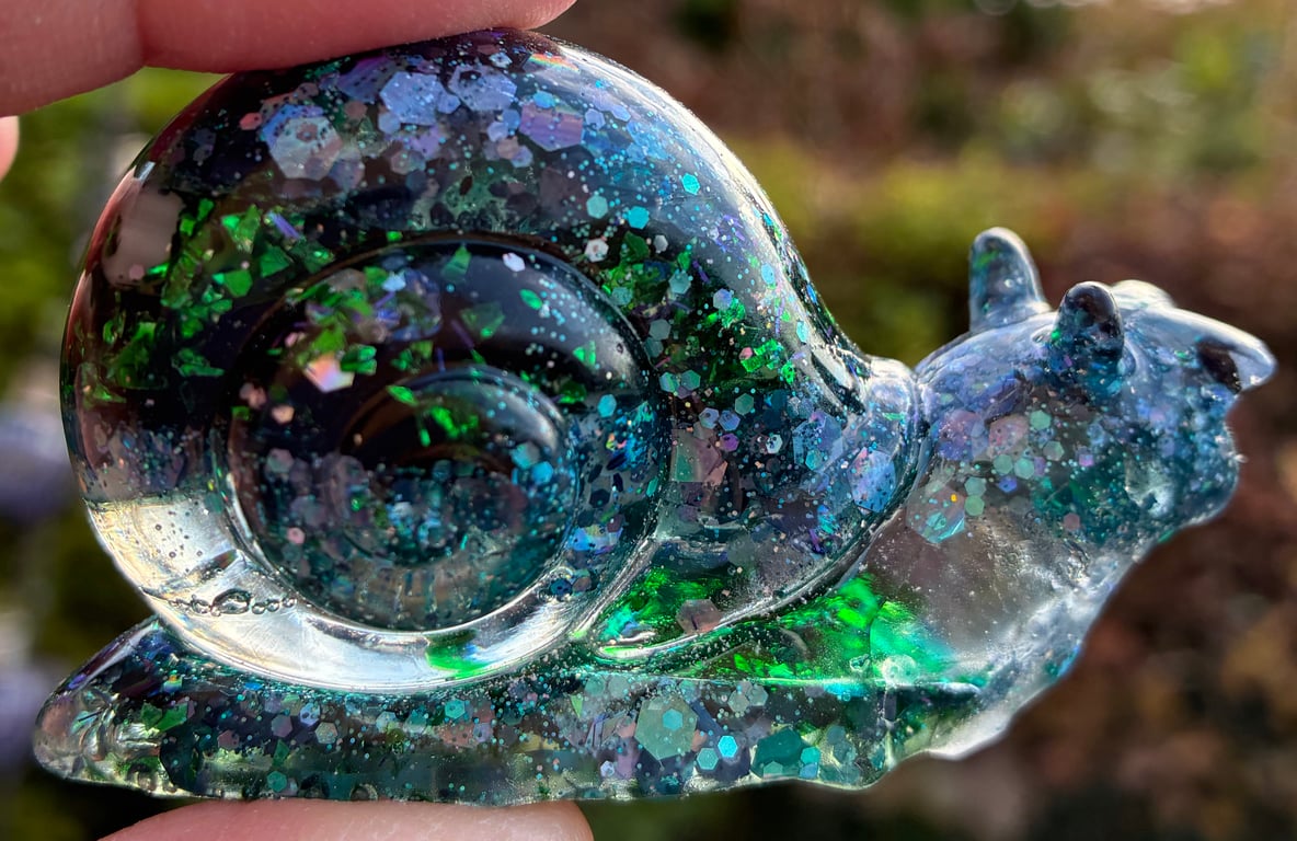 Resin snail with glitter and shell bead pieces