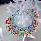 Colourful beaded hoop earrings 