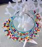 Colourful beaded hoop earrings 