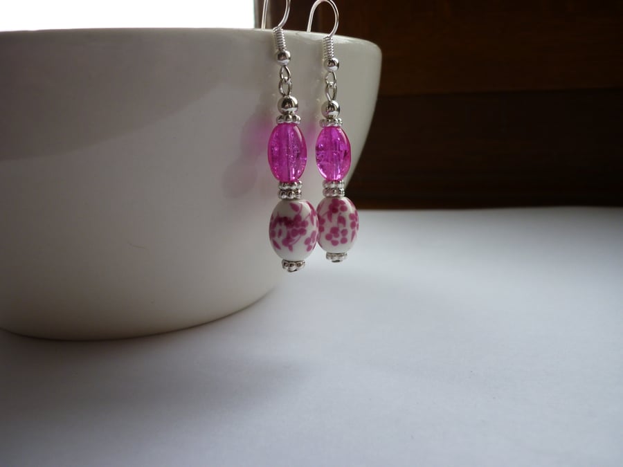DEEP PINK, WHITE AND SILVER FLORAL CERAMIC DANGLE EARRINGS.