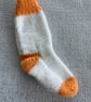 Orange and white baby socks - Image 2