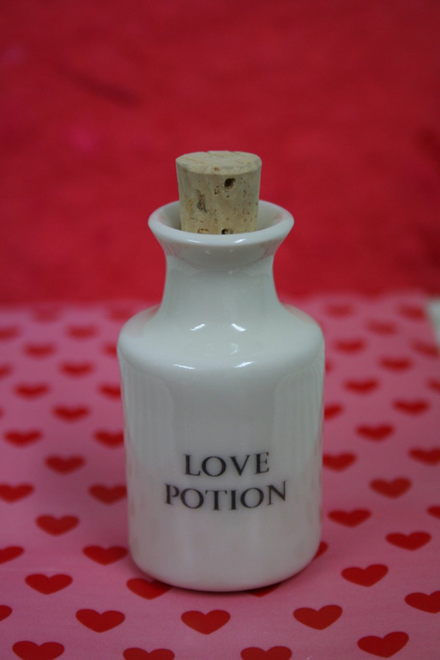 Small porcelain bottle with love potion wording