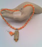 Peach Rectangle with Floral Pattern on an Orange and Peach Necklace & Earrings  - Image 10
