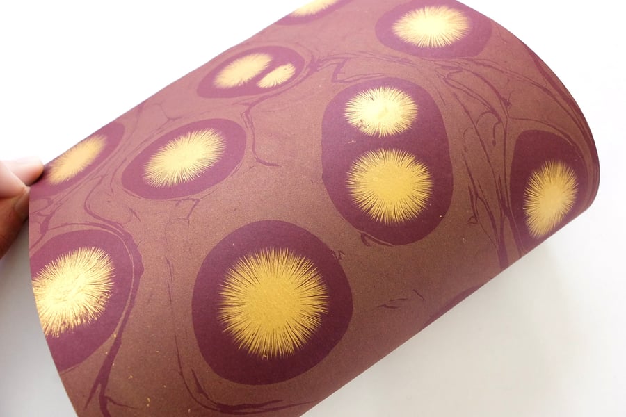  'Star burst fracture' pattern A4 Marbled paper sheet in burgundy and gold 