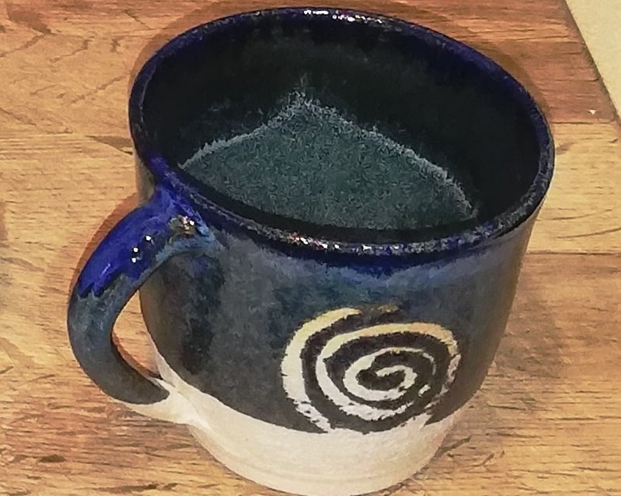 Spiral decorated, ceramic mug
