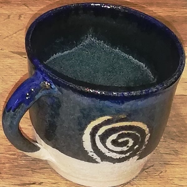 Spiral decorated, ceramic mug