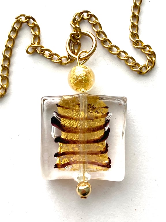 Murano glass gold spangle pendant with Swarovski crystal.