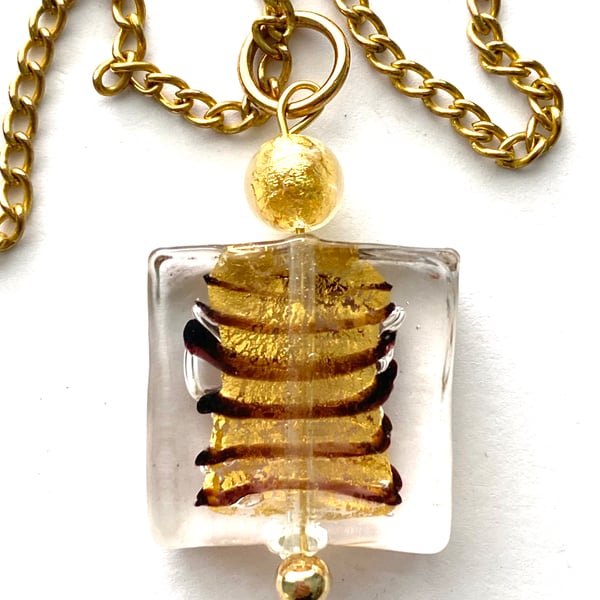 Murano glass gold spangle pendant with Swarovski crystal.