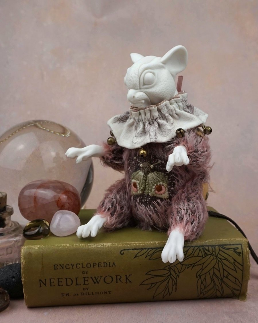 ‘Brindle’, a porcelain and textile mouse doll.