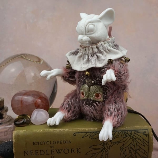 ‘Brindle’, a porcelain and textile mouse doll.