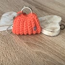 Small bad key, ear buds, coins holder