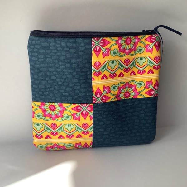 Denim and Patchwork makeup bag. 
