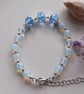 Opalite and glass crystal beaded bracelet with adjustable chain