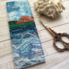 Embroidered seascape bookmark.