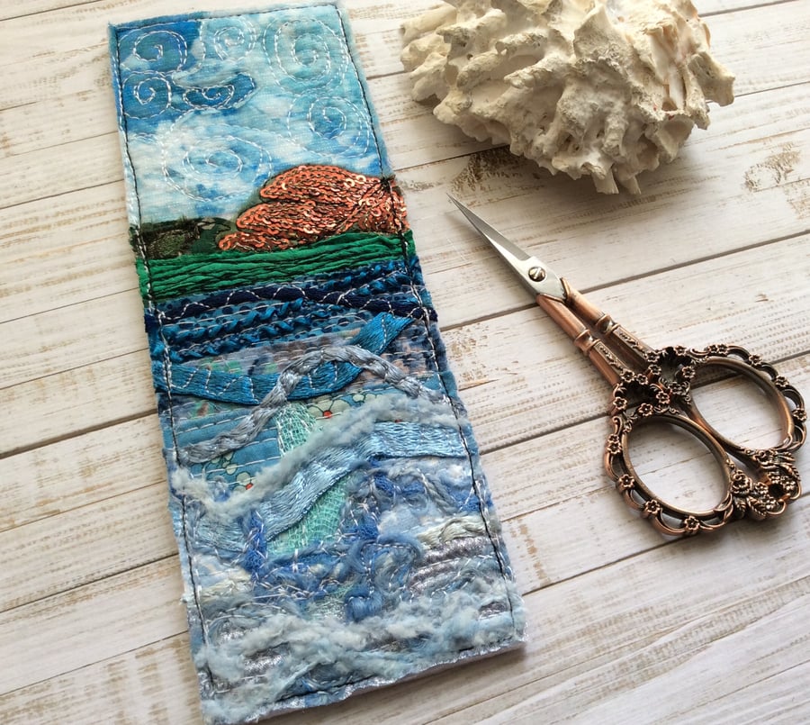 Embroidered seascape bookmark.