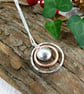 Circles Necklace. Recycled Sterling Silver Pebble with Copper Fidget Pendant