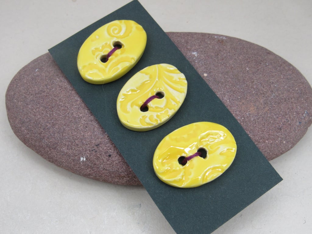 3 Medium Oval Lemon Yellow Brocade Pattern Ceramic Buttons