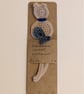 Handmade crochet cat bookmark - light brown with blue collar