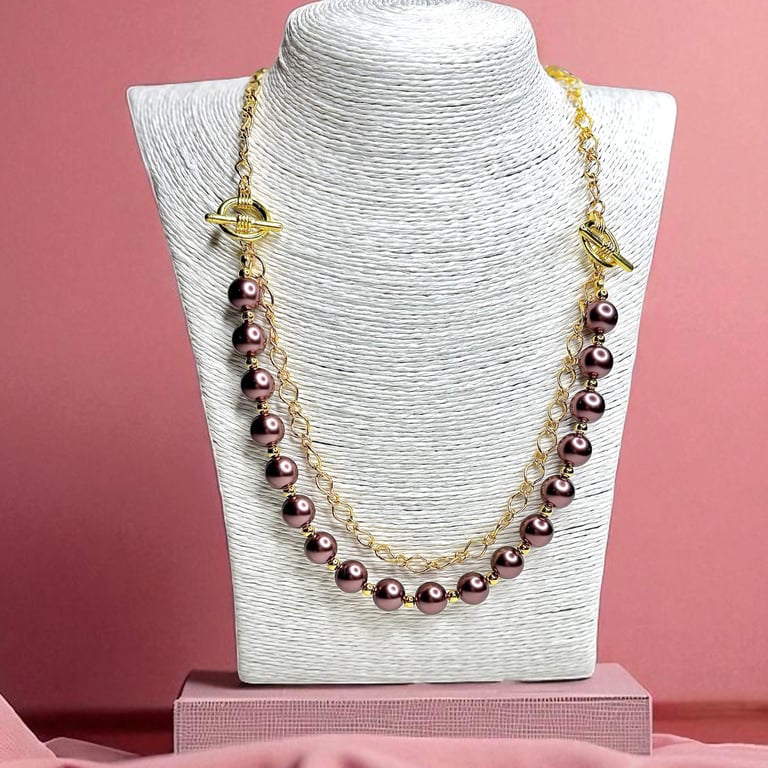 Elegant Glass Pearl necklace with twin toggle clasps feature.