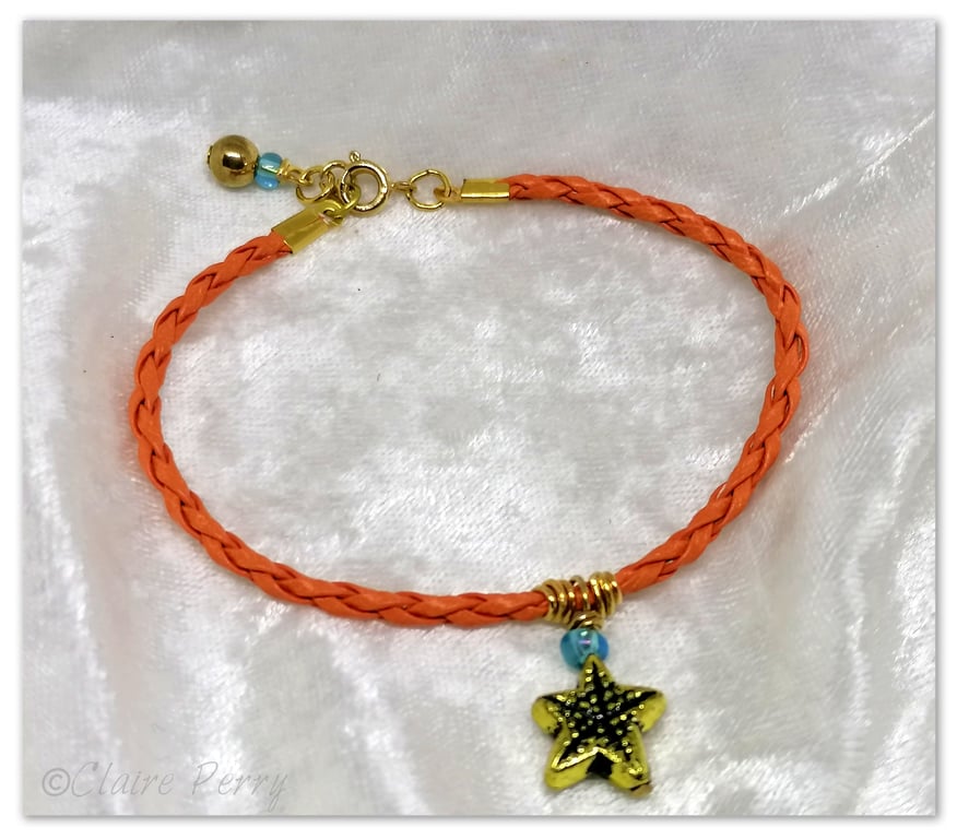 Bracelet Orange Faux Leather with gold plated Starfish charm bead.