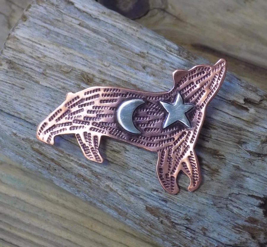 Copper and silver 'celestial bear' or moon bear mixed metal brooch 
