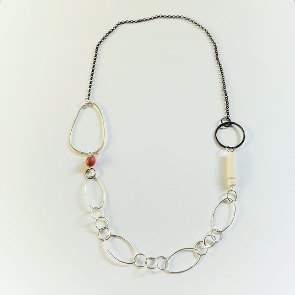 Unusual silver, black red and white quirky chain necklace