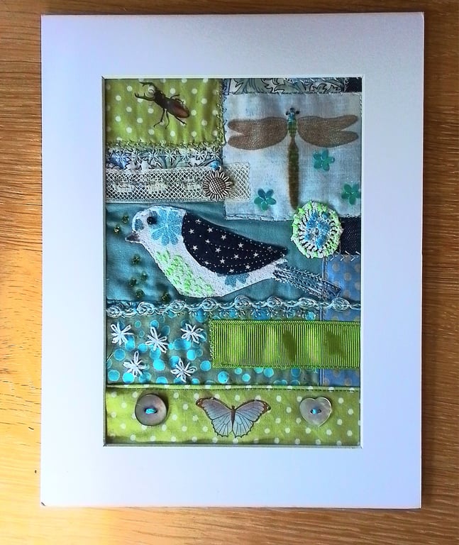 Mixed media picture with dragonfly, bird and butterfly. 