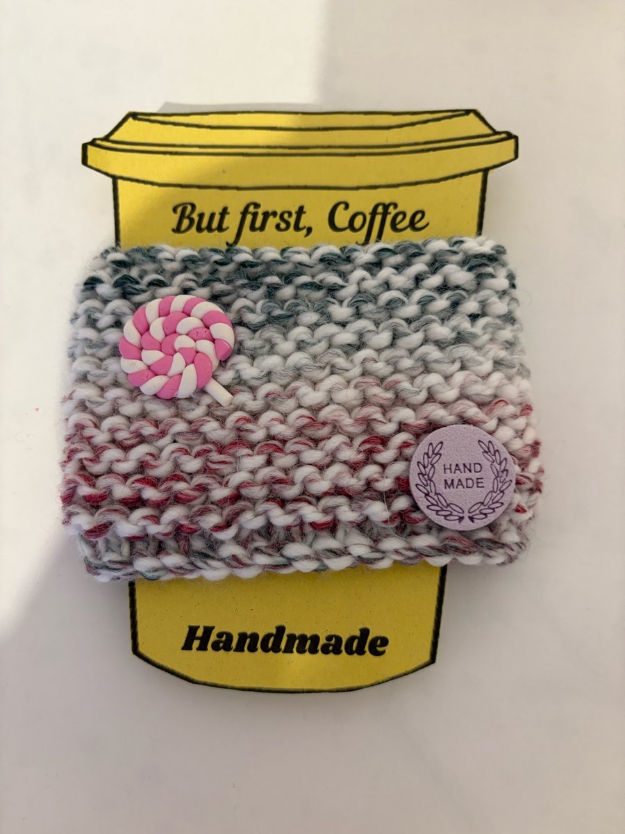 Lollipop knitted cup cosy. 
