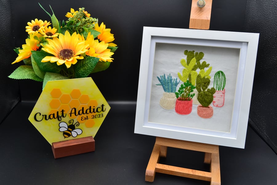 Framed hand stitched artwork