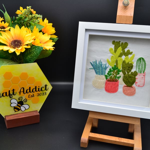 Framed hand stitched artwork