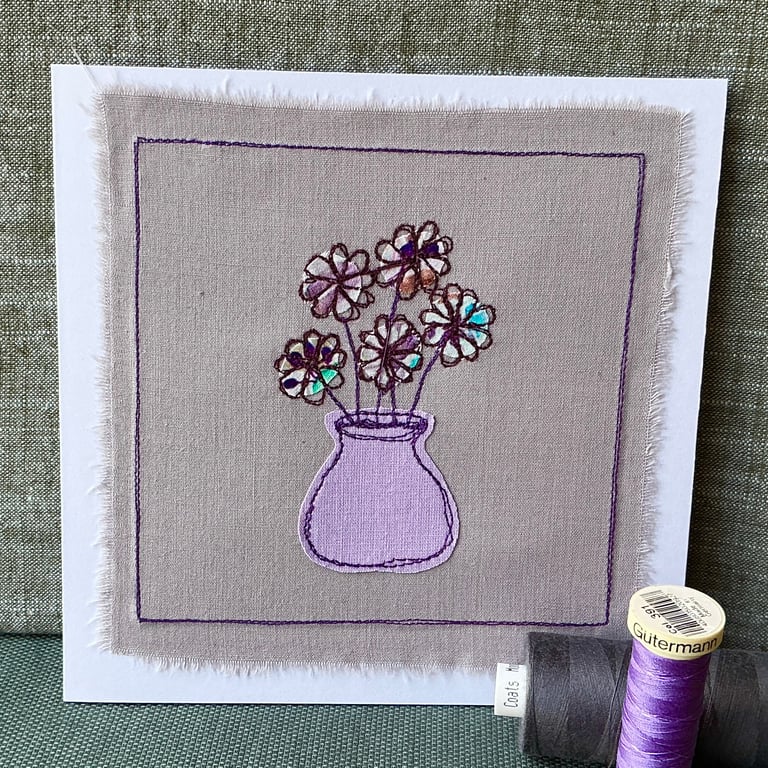 Embroidered appliqué greetings card with envelope.