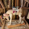 The Festive Forester handmade soft sculpture deer textile art.