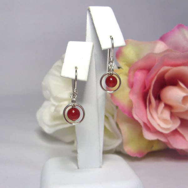 Carnelian gemstone dangle earrings with bead in a ring of recycled silver