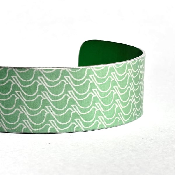 Geometric bird pattern cuff bracelet light green