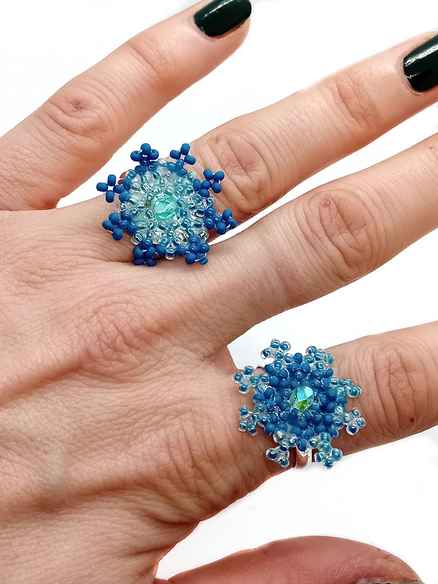 Blue beaded snowflake adjustable rings