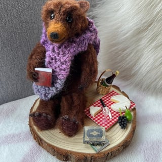 Needle felted Scruffy Bear character, wearing a hand knitted scarf with picnic