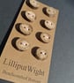 Set of eight small flat driftwood buttons - Image 5