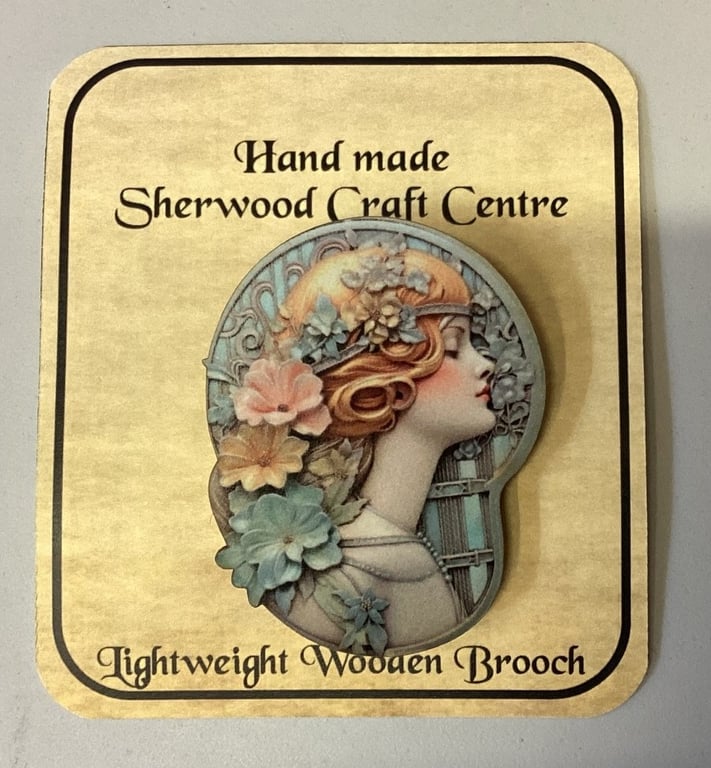 Art Nouveau wooden brooch. 