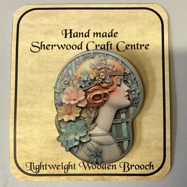 Art Nouveau wooden brooch. 