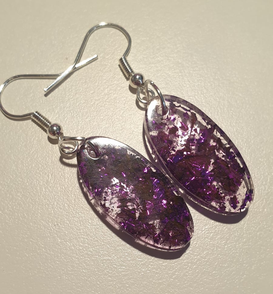 Oval purple metallic flakes resin earrings