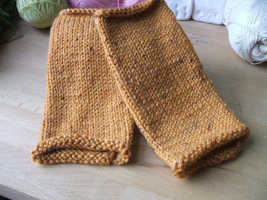 Pair of hand knitted wrist warmers or fingerless gloves - mustard colour